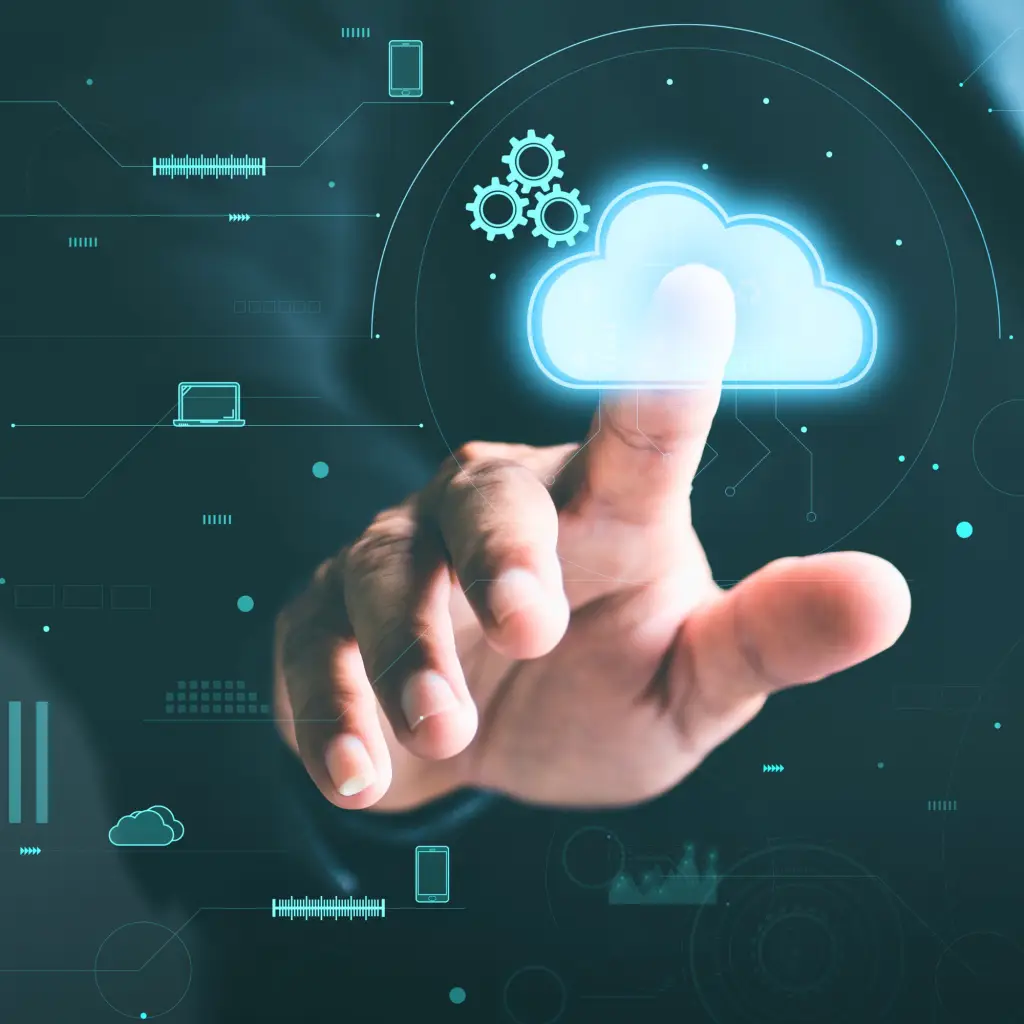 A finger touching a cloud icon on a screen viewed from the inside of a computer